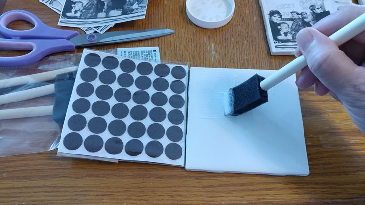 apply the bottom coat of mod podge